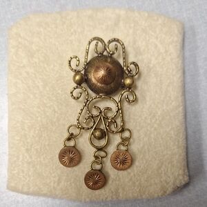 Elegant Gold and Bronze Pendant